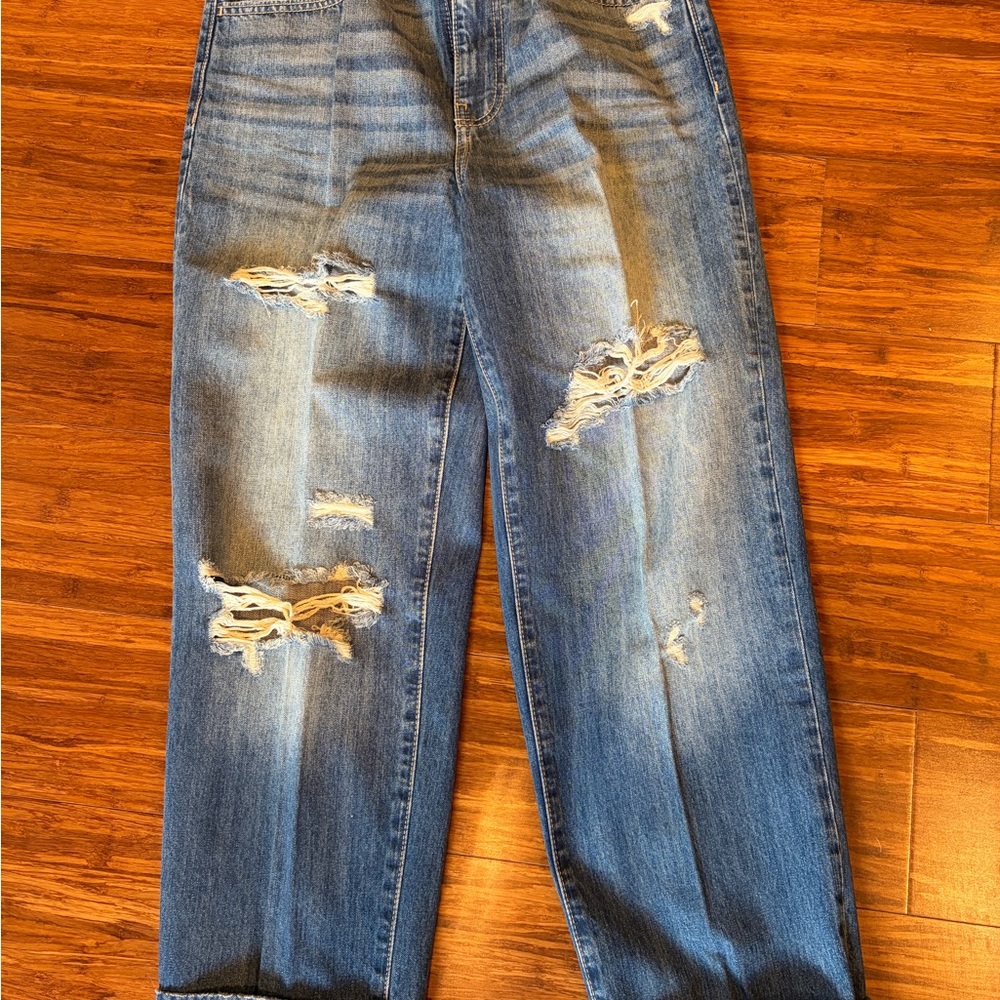 Distressed Blue Jeans
